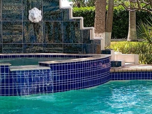 How Do I Clean My Lake Worth Pool Tiles and Coping?
